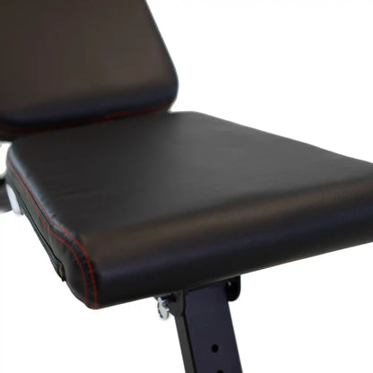 Black weight bench with padding on a white background
