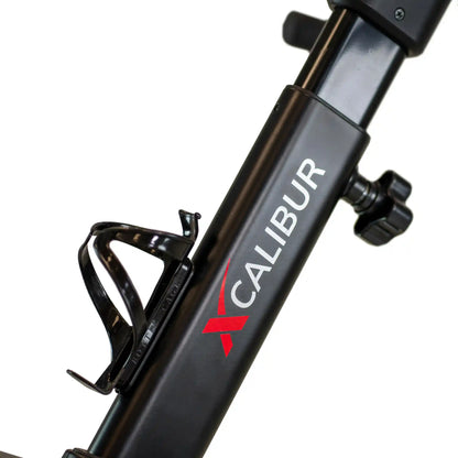 Close-up of a bicycle frame with 'Calibur' branding on a white background