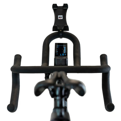Black exercise bike with digital display on a white background