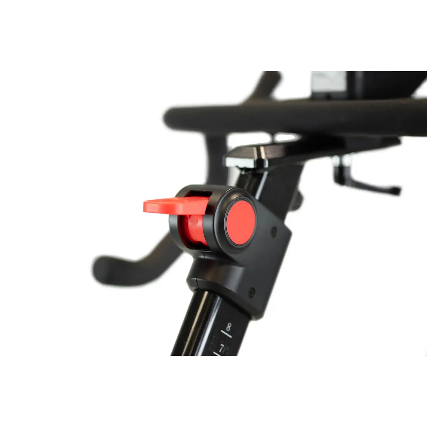 Close-up of a bicycle handlebar with red brake lever on a white background