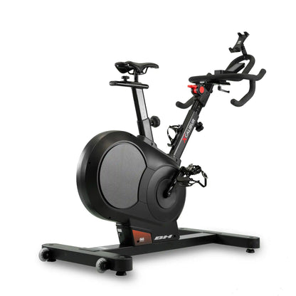 Black exercise bike with a stand on a white background