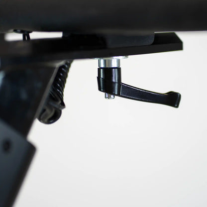 Close-up of a black adjustable handle bar lever with a white background