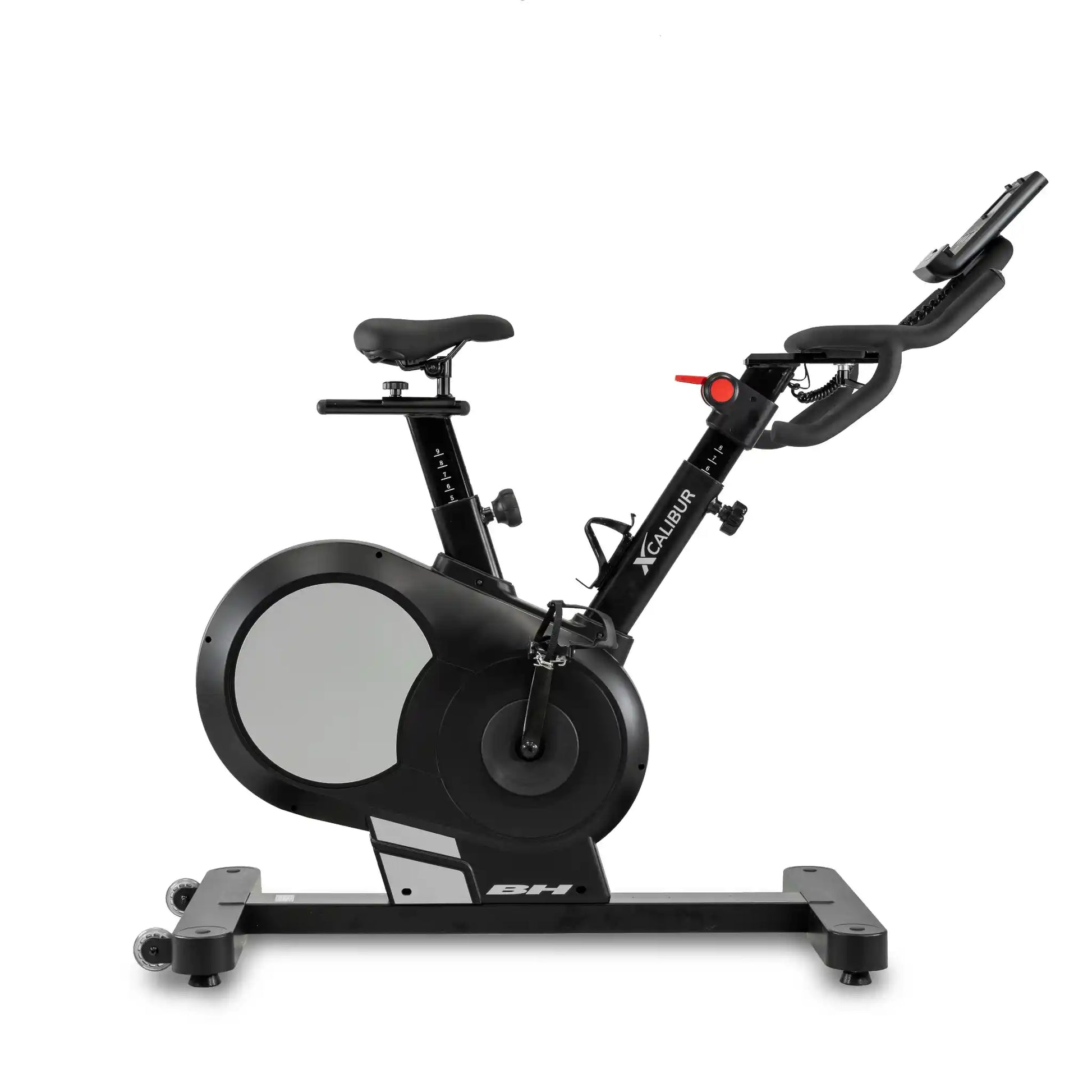 Black exercise bike with a white background