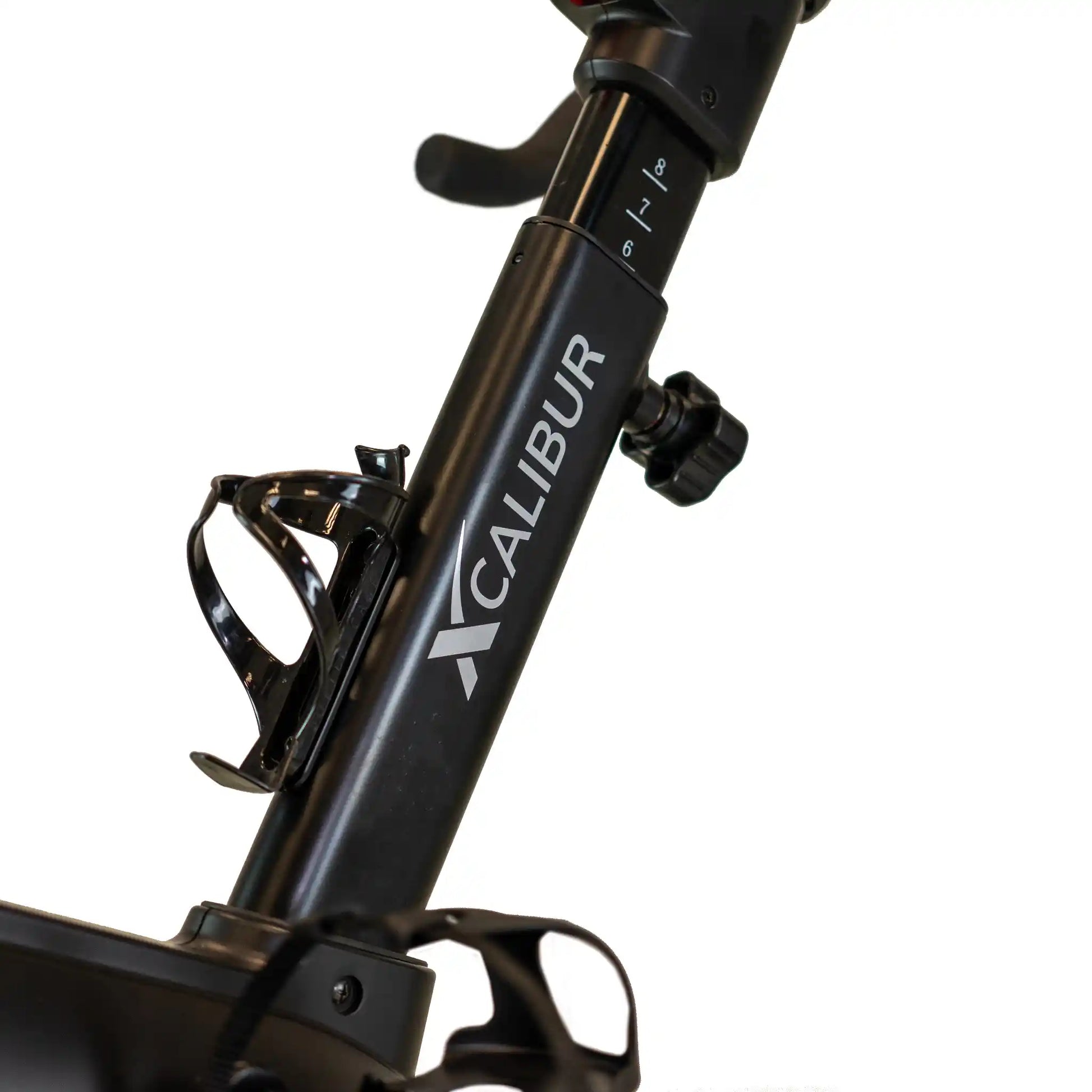 Black exercise bike with visible branding on a white background