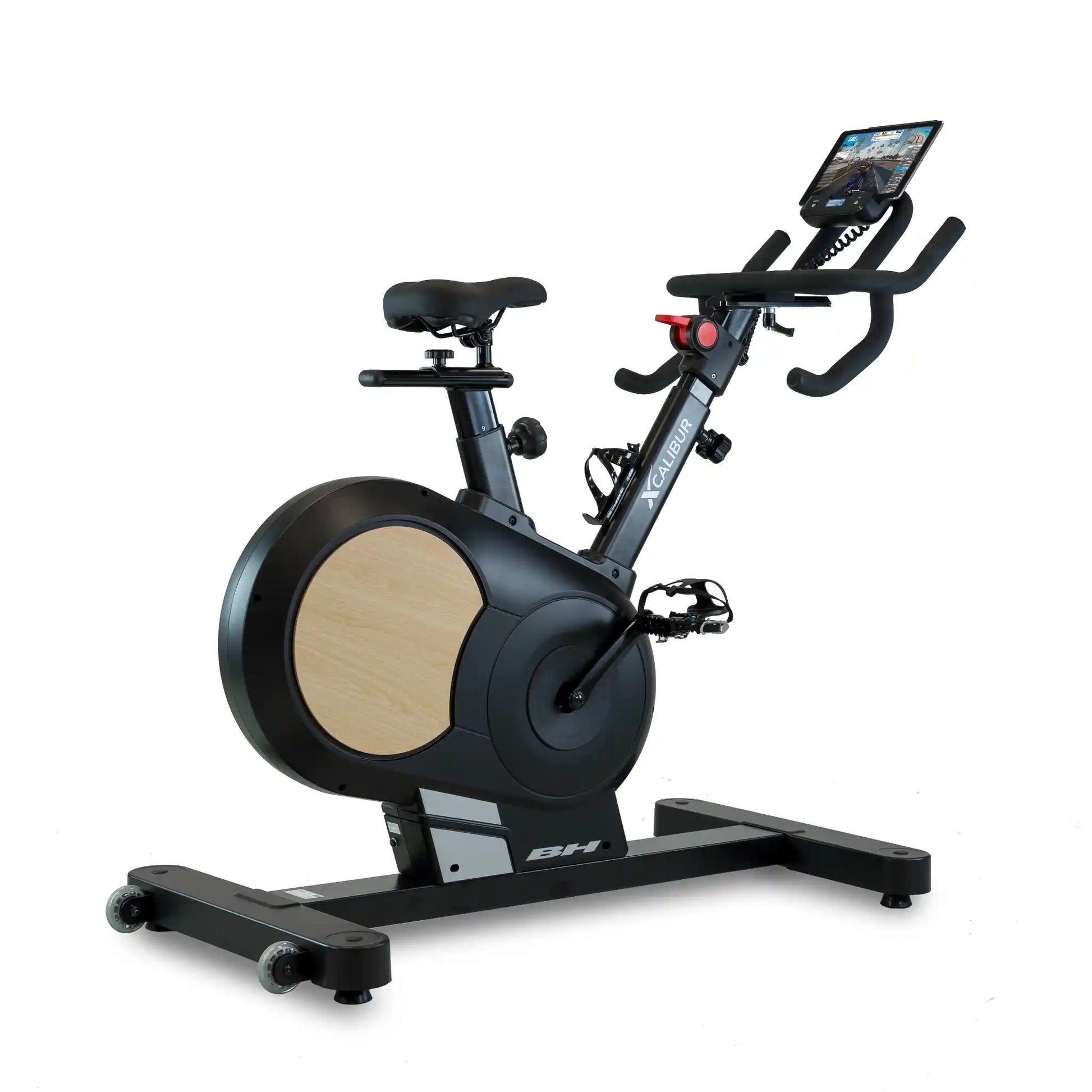 Black exercise bike with wooden details on a white background