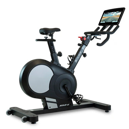 Exercise bike with a multimedia display on a white background