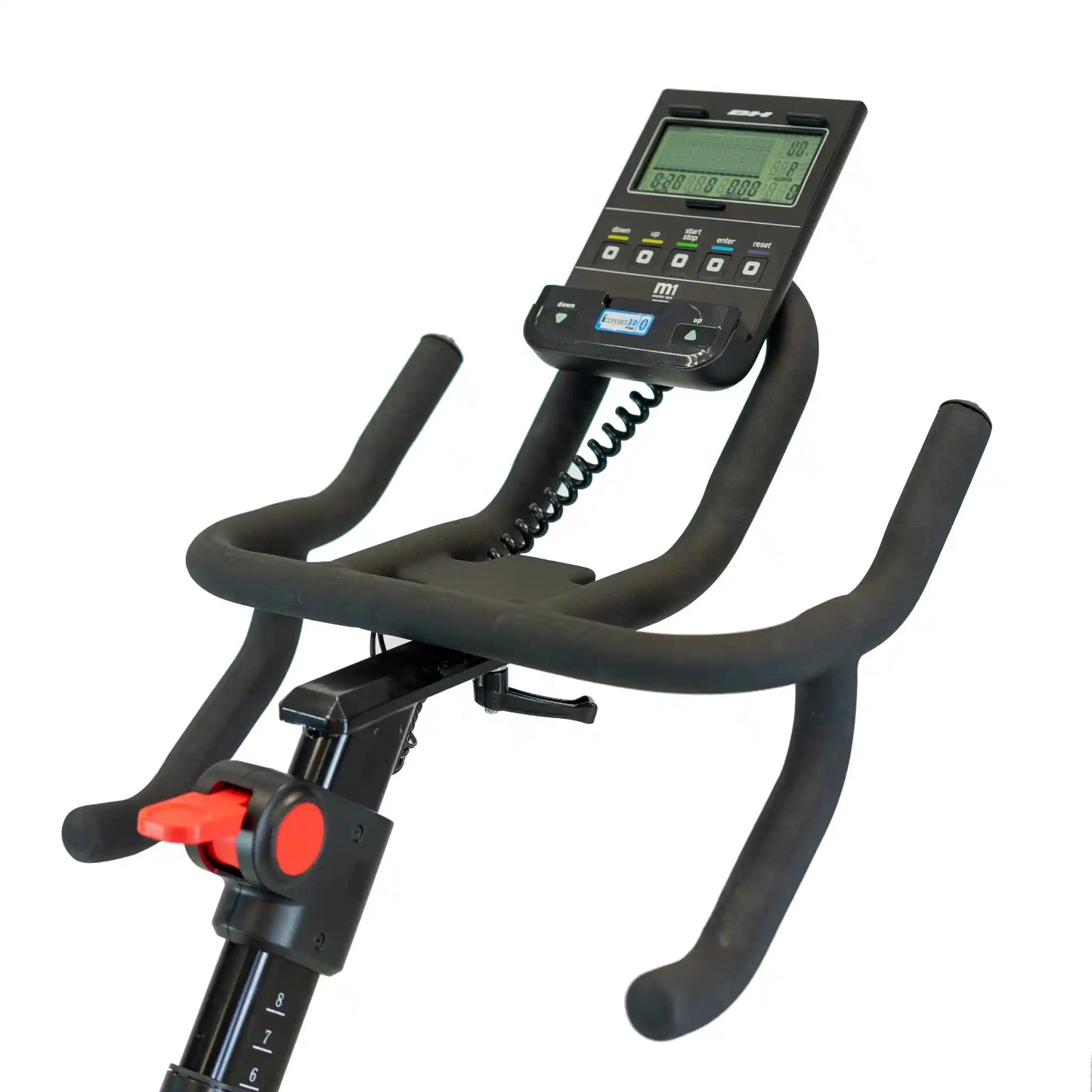 Black exercise bike with digital display on a white background