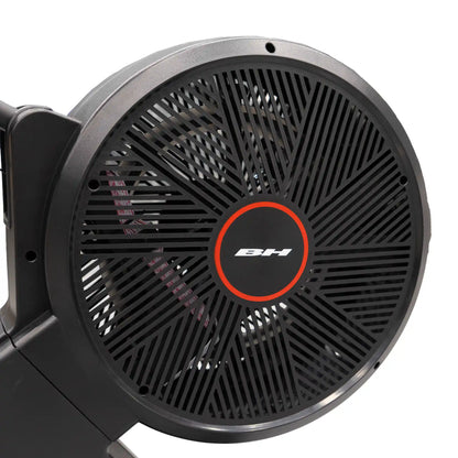 Close-up of a black fan on rowing machine with 'BH' logo on a white background