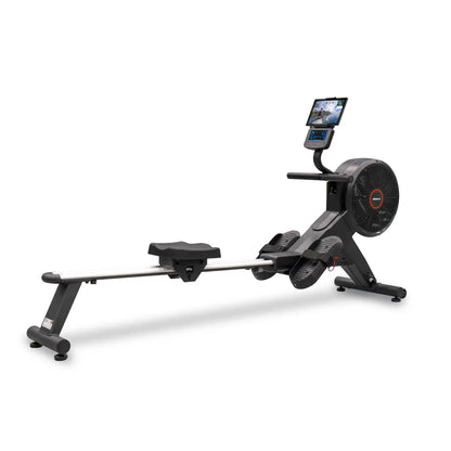 Rowing machine with digital display on a white background