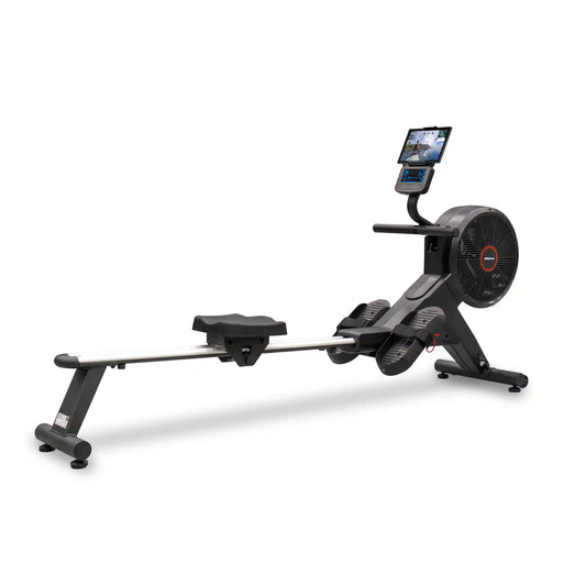 Rowing machine with digital display on a white background