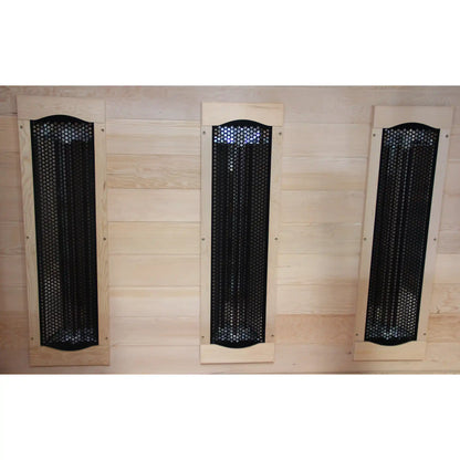 Three infrared panels with grilles on a wooden background