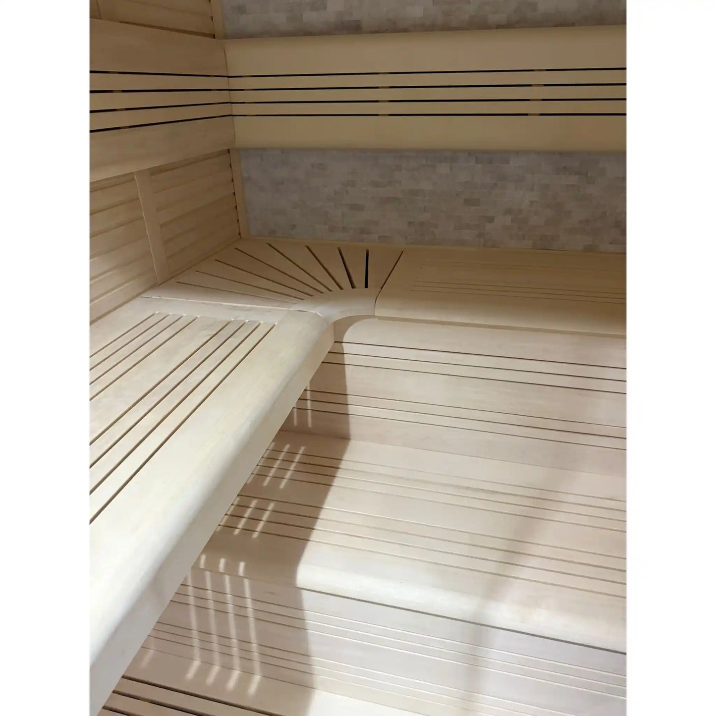 Corner of a wooden sauna with bench seating