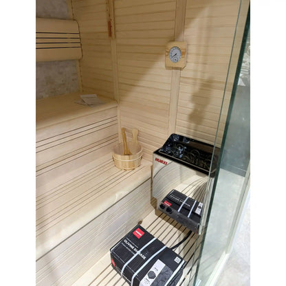 Wooden sauna with a heater and equipment inside