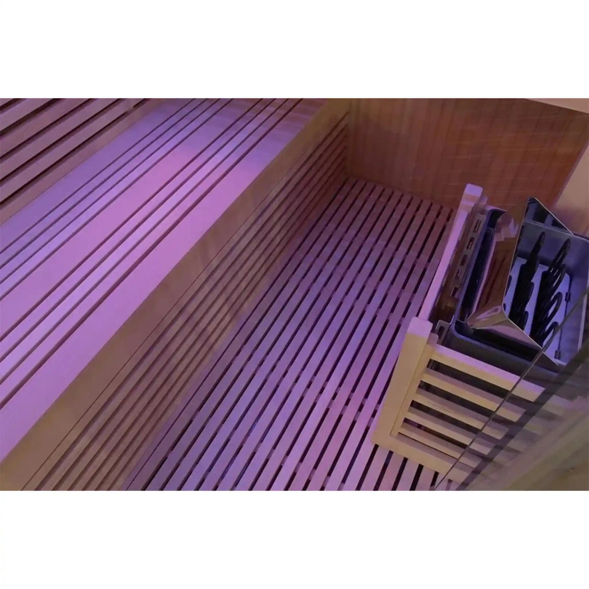 Sauna with wooden bench, stove and pink lighting