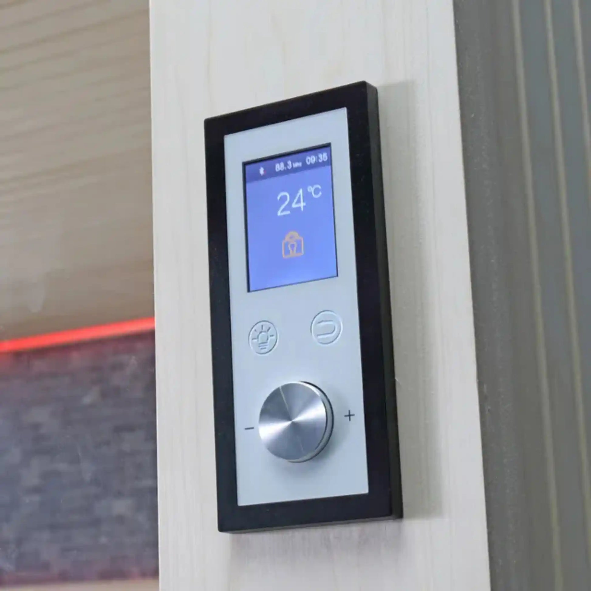 Digital thermostat on a external sauna wall