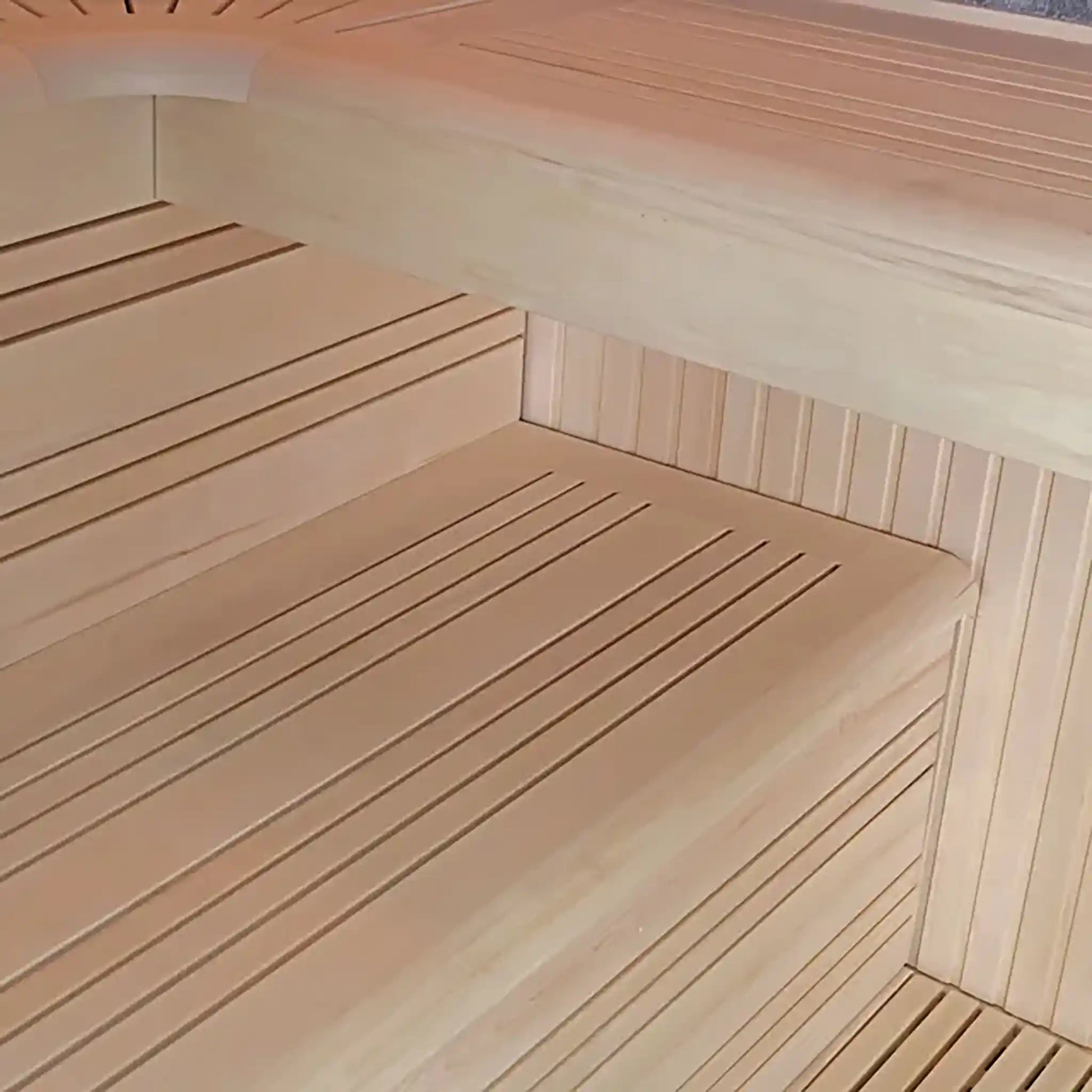 Wooden bench in a sauna with a focus on texture and material.