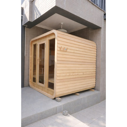 Wooden sauna structure outside a modern building
