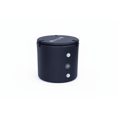 Inflatable black ice bath with valves and pipe connection points on white background