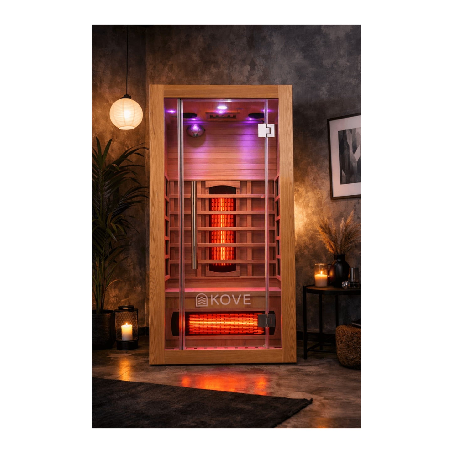 Infrared sauna with Kove branding in a dimly lit room.