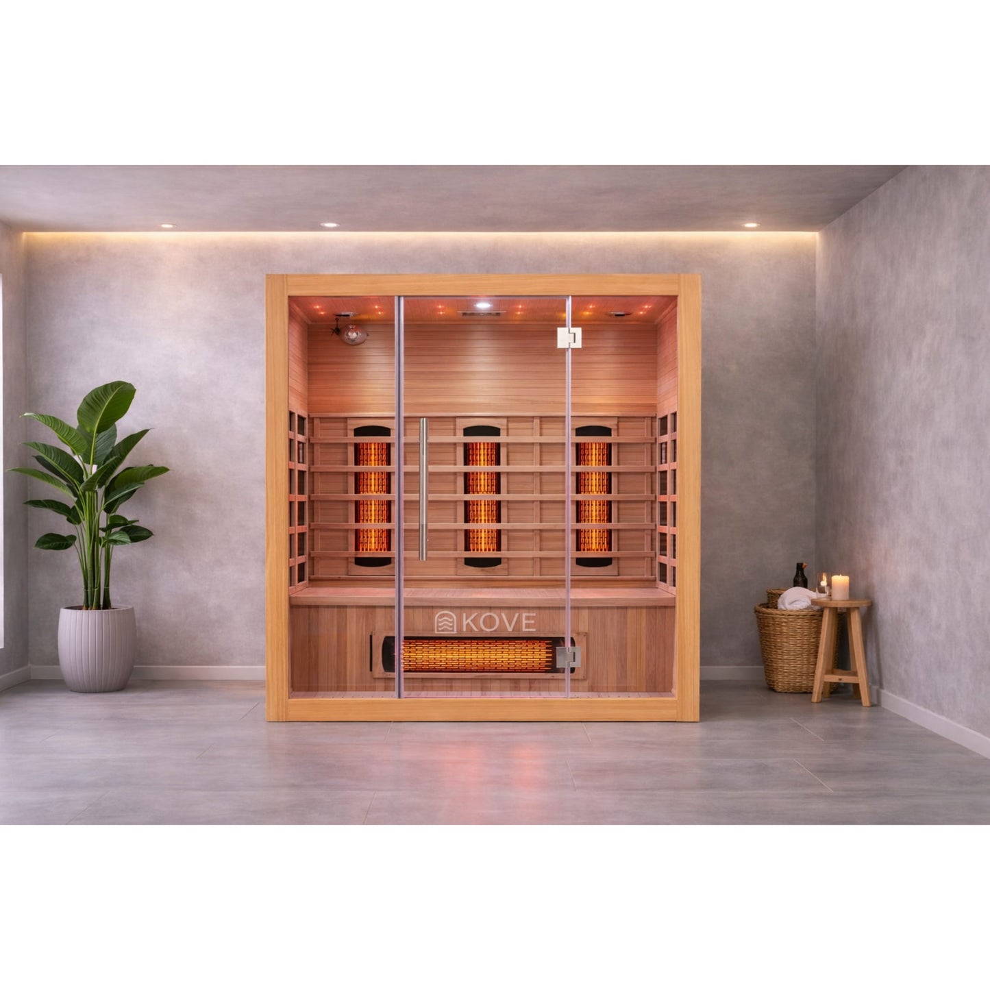 Infrared sauna with Kove branding in a room with a plant and candles.