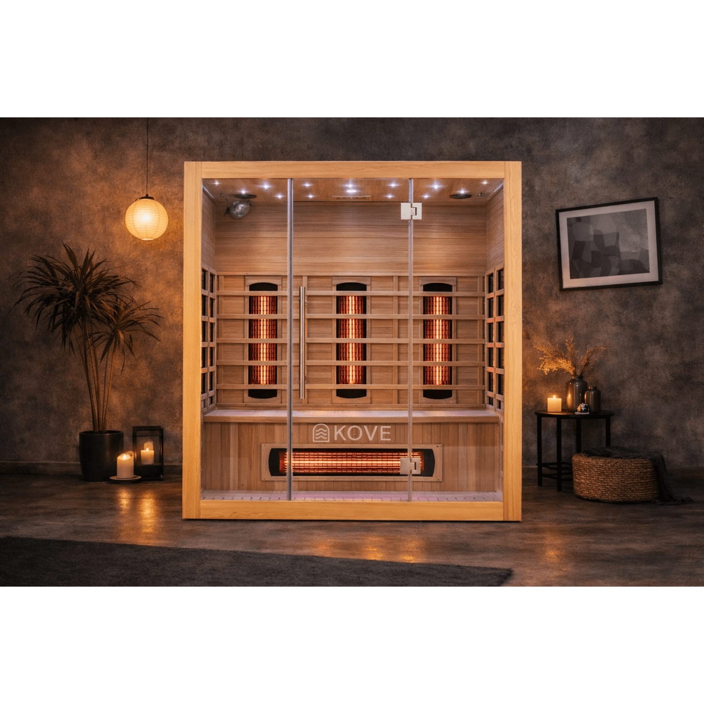 Infrared sauna with Kove branding in a dimly lit room.