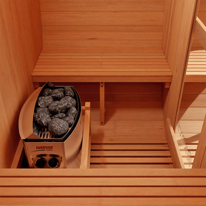 Wooden benches and heater in Kove Barrel Sauna
