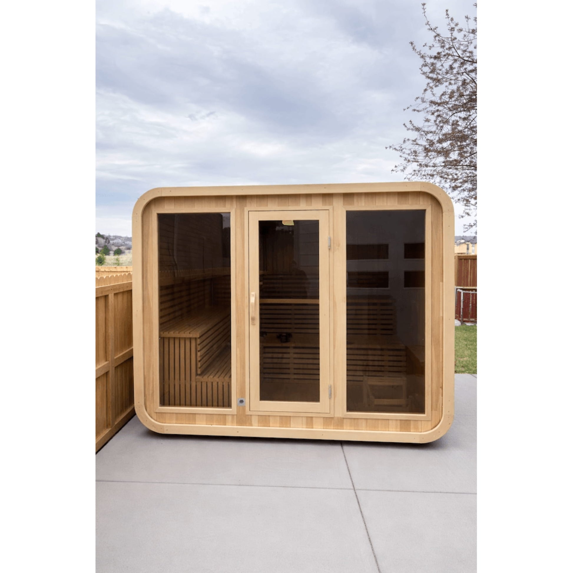 Wooden Kove Cube Sauna in a garden