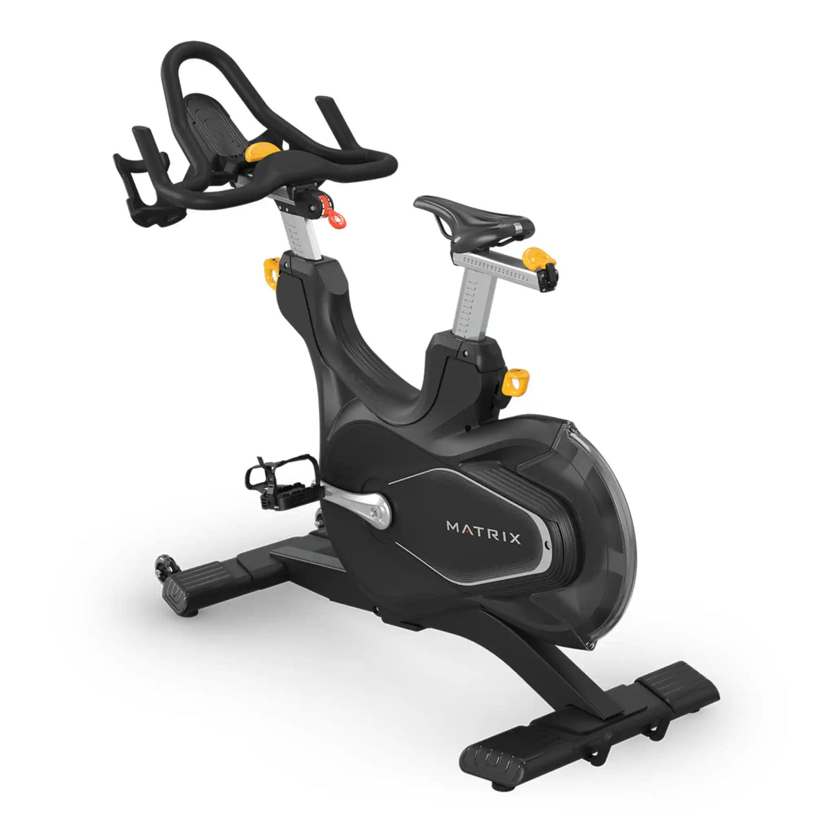 A black and silver MATRIX indoor cycling machine with yellow accents, shown from a three-quarter angle on a white background.