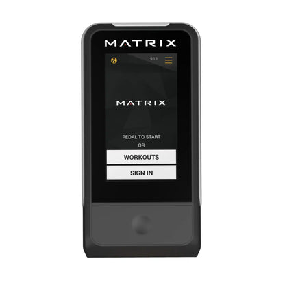 A Matrix digital workout device with a black and grey casing, featuring a screen displaying the 'MATRIX' app interface with options to start, workouts, or sign in.