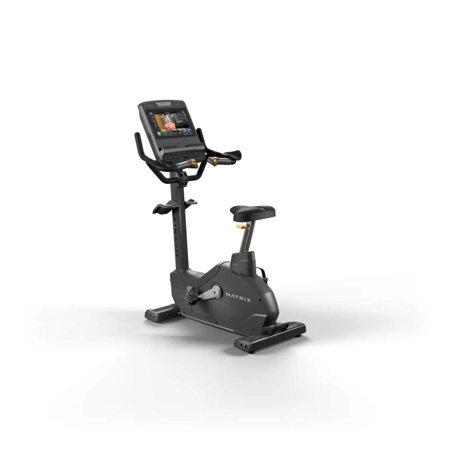 Black exercise bike with digital display on a white background