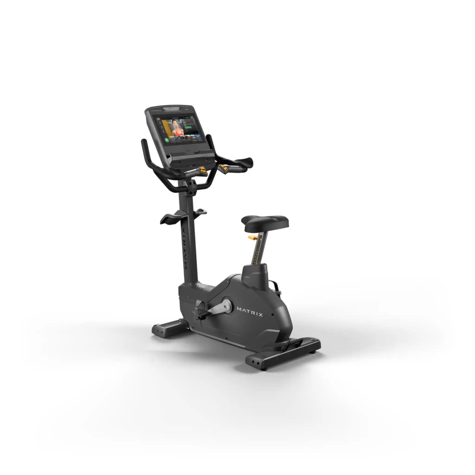 Black exercise bike with digital display on a white background