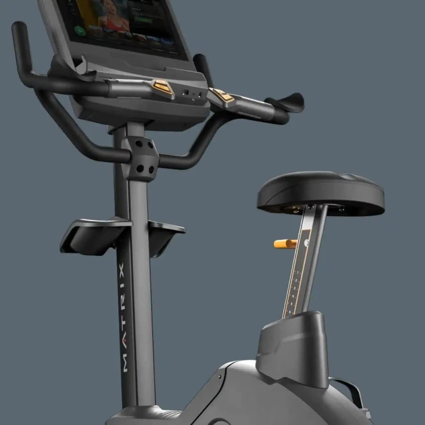 Exercise bike with digital display on a gray background