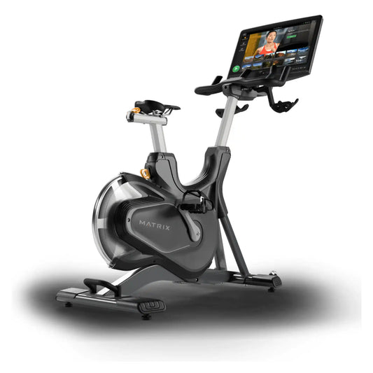 Matrix exercise bike with a screen on a white background