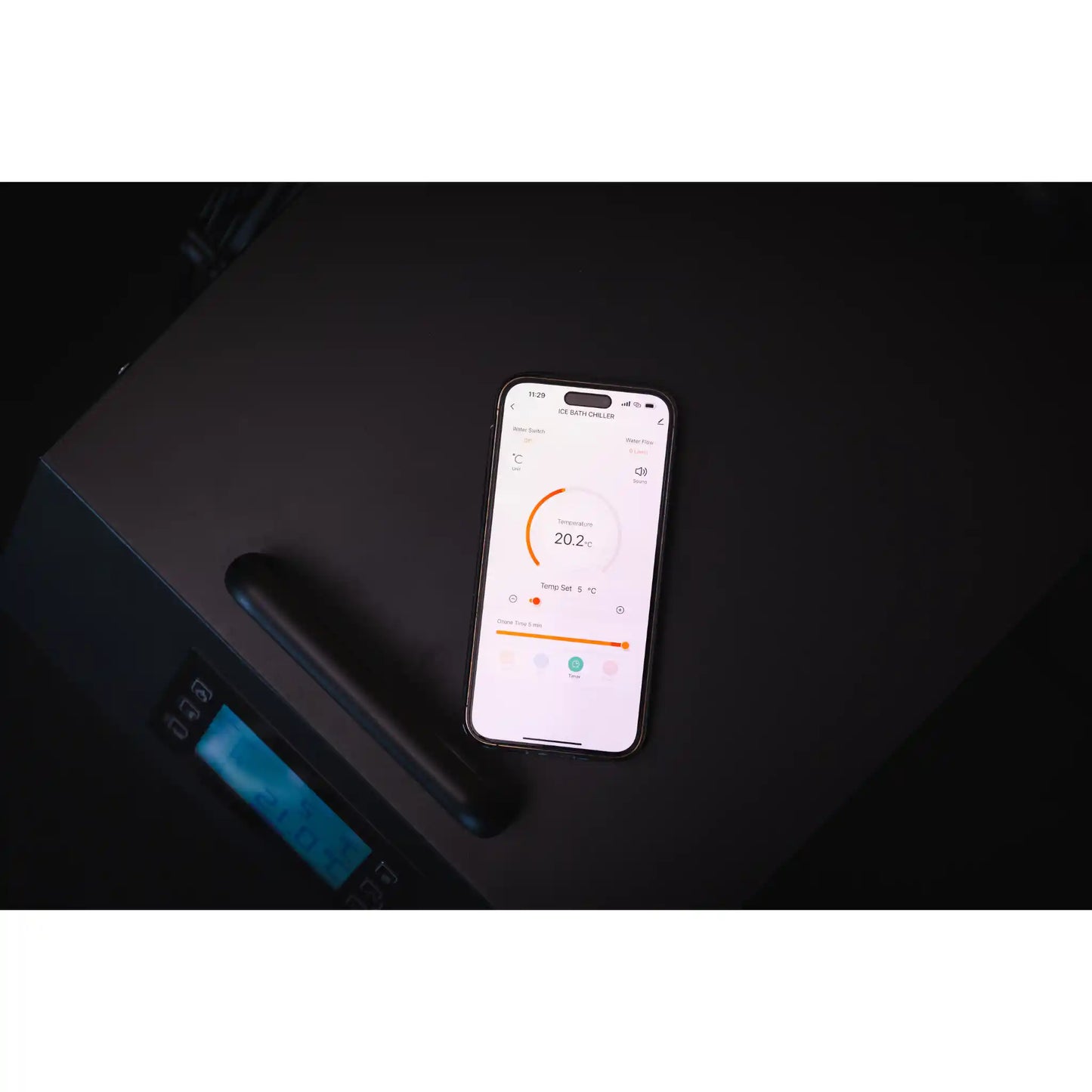 Smartphone displaying temperature reading within an app