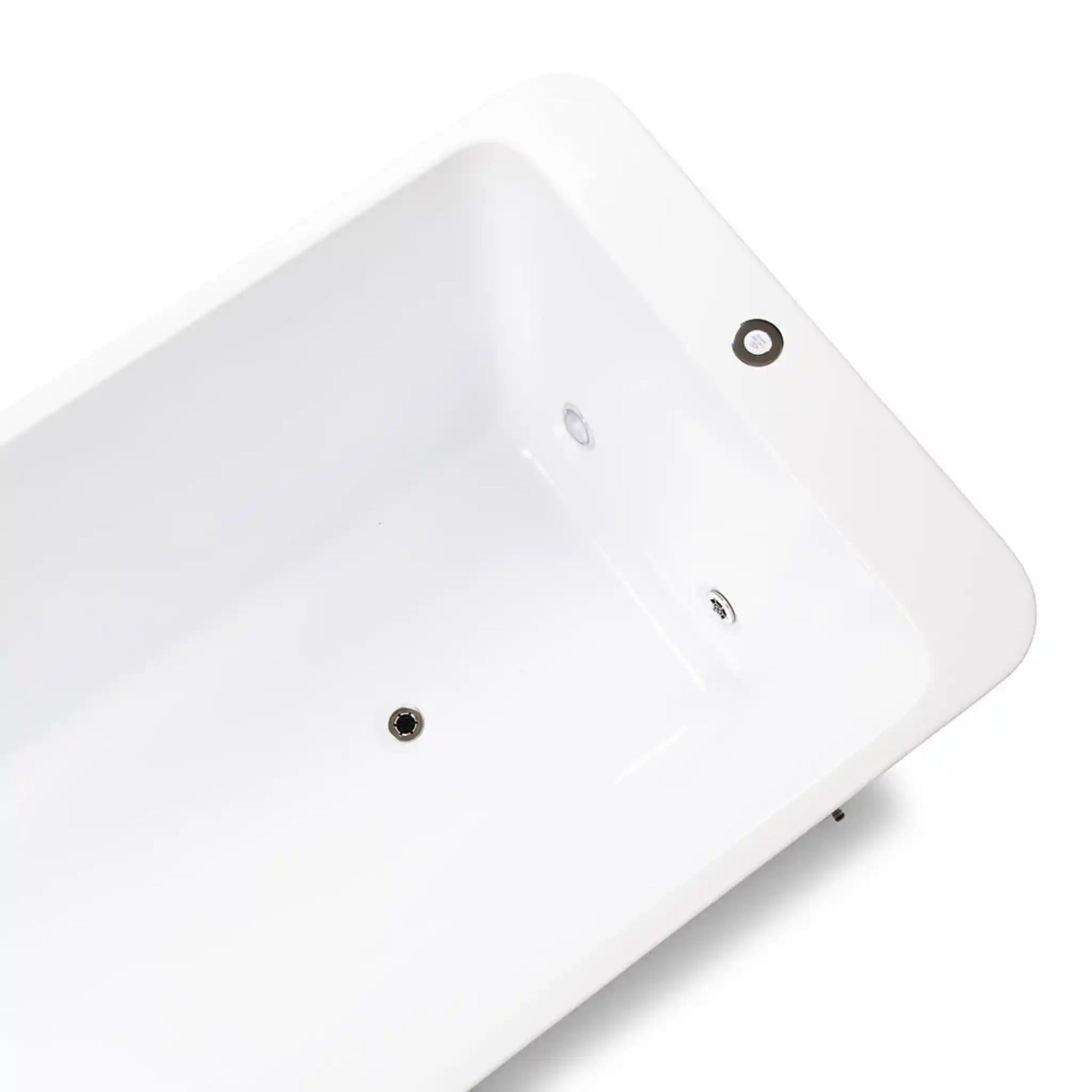 Close-up of the inside of a white ice bath on a white background