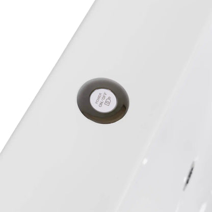 Close-up of a white power button for lighting on a white ice bath 