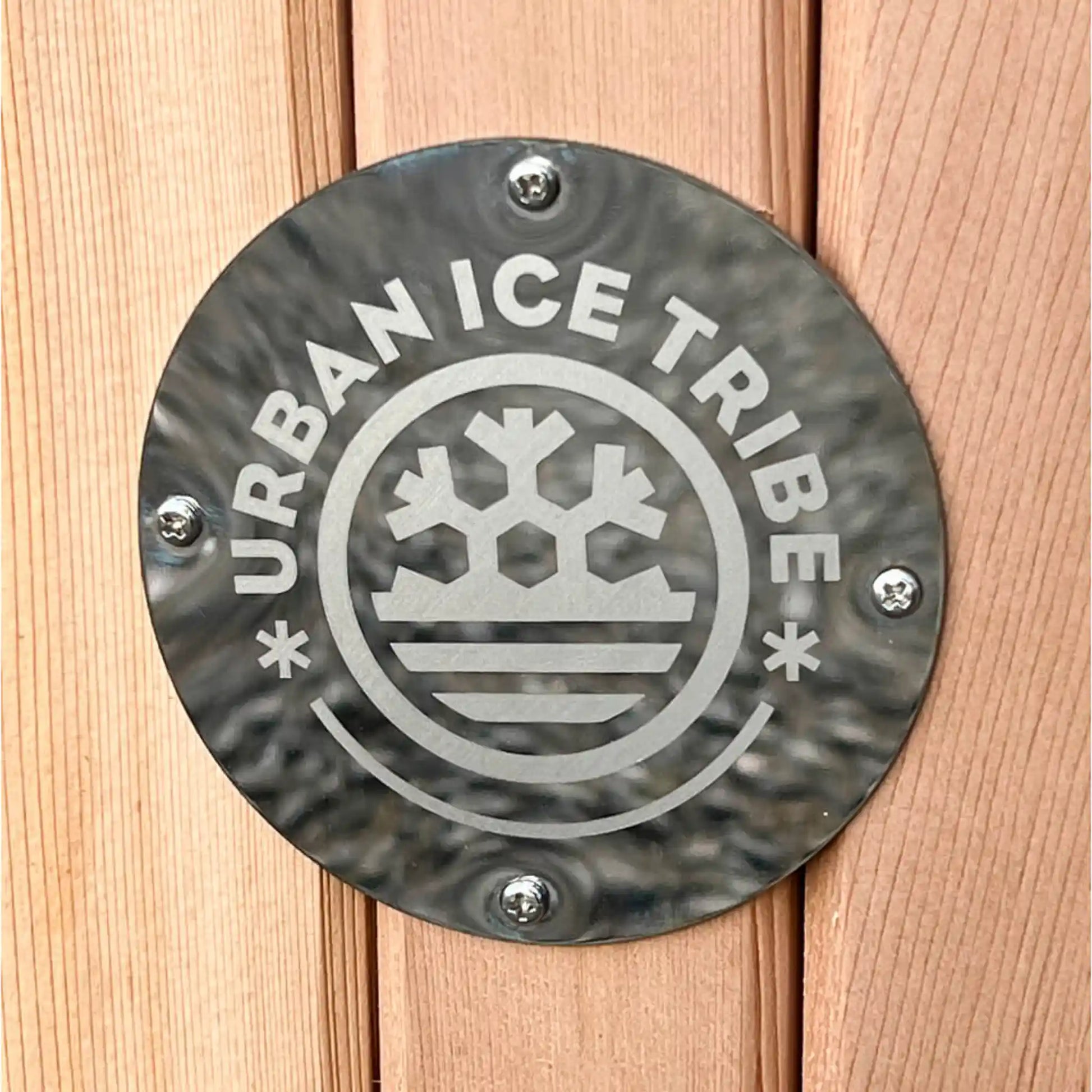 Urban Ice Tribe branded badge on wooden ice bath